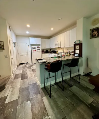 Bar top seating; pantry closet