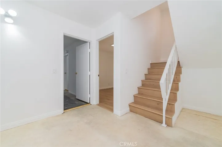 1st Stairs to Garage, Laundry area