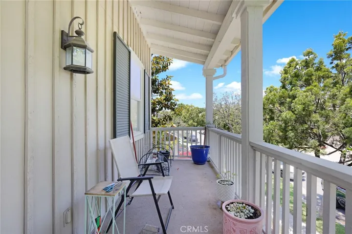 Balcony looking off front of the house ~