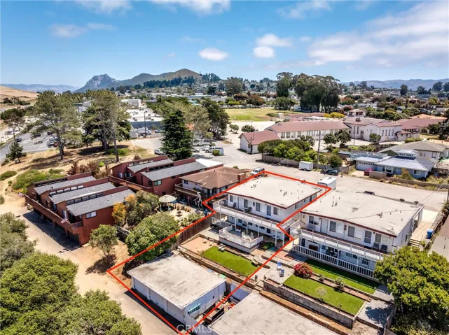 4 Plex with 3 lower garages, 7 total.