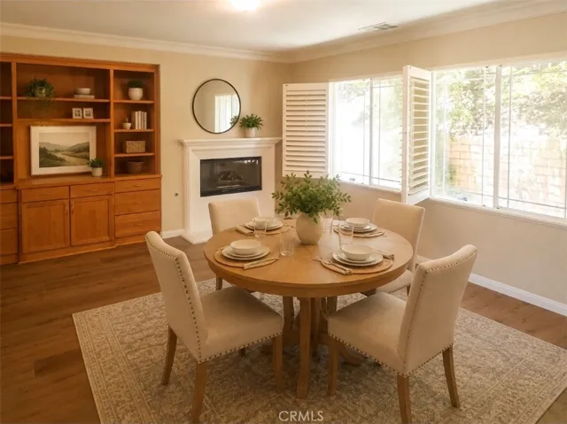 Artificially staged Family room adjacent to kitchen