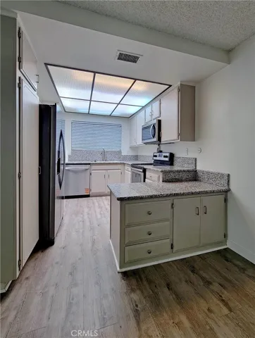 Granite counter tops and skylight.