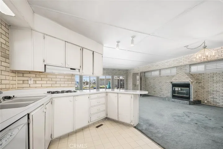 Kitchen opens to living room