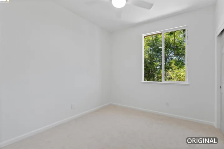 Neutral-toned carpeting throughout