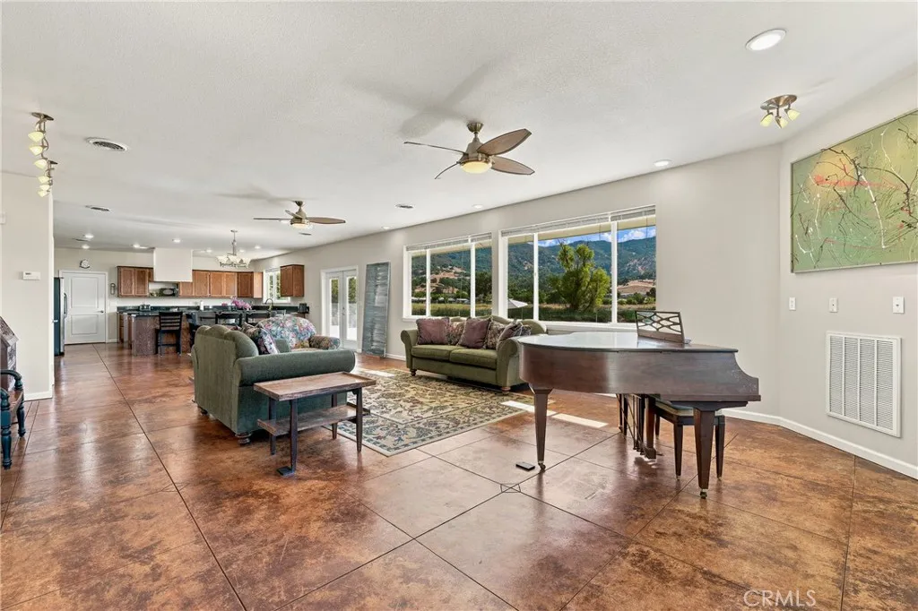 Living room with concrete flooring.