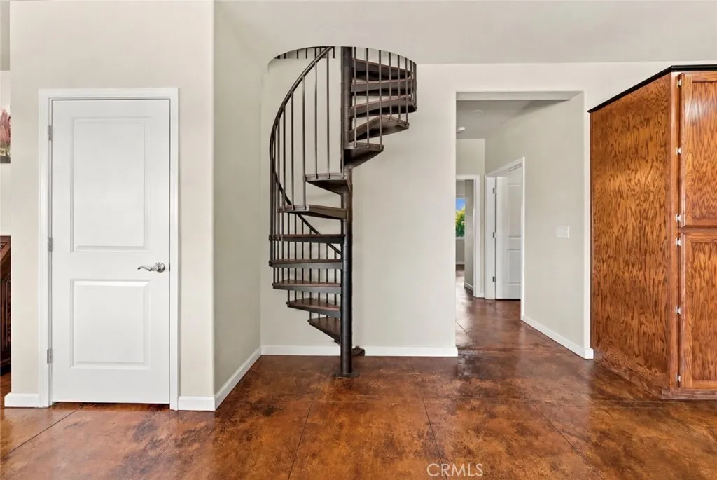 Wall is framed to support a staircase. Photo is digitally enhanced to illustrate one possible design.