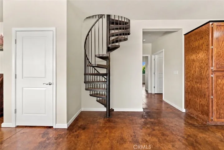 Wall is framed to support a staircase. Photo is digitally enhanced to illustrate one possible design.
