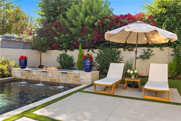Zen backyard with salt water pool and spa