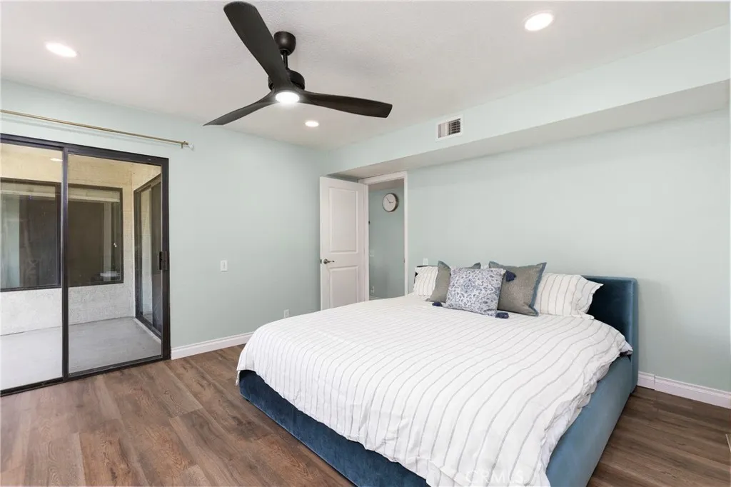 Spacious primary suite opens to large balcony