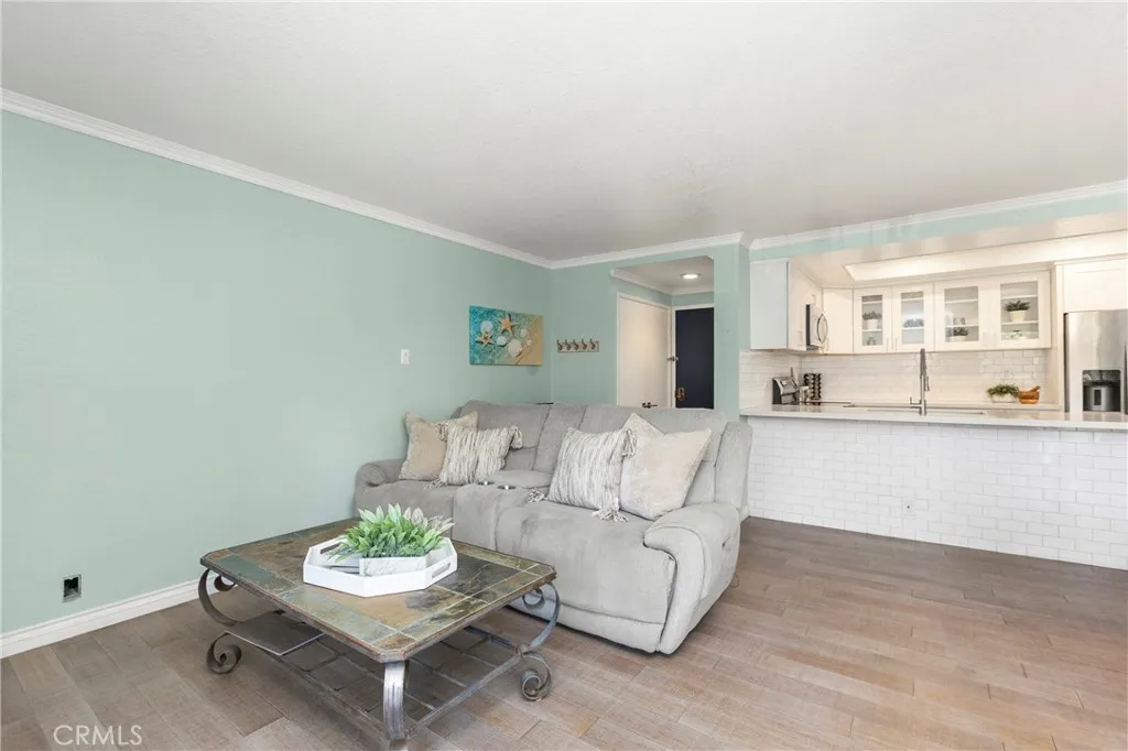 The double door coat entry coat with brushed hardware closet adds even more storage
