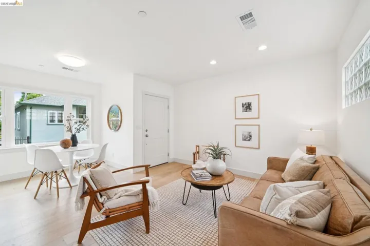 Bright interior space featuring light wood-finish flooring and recessed lighting