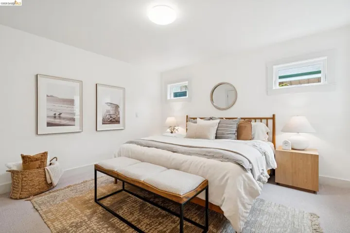 Bright room featuring white walls and recessed lighting