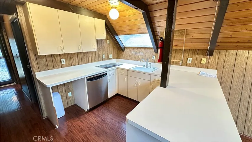 Open kitchen with breakfast bar area.
