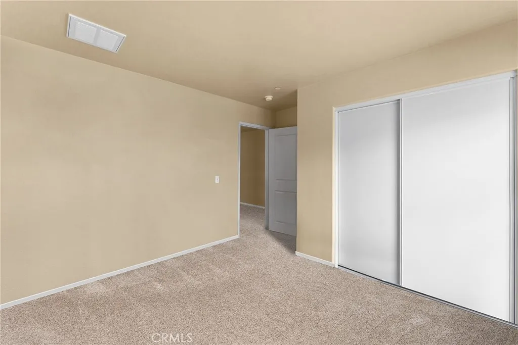 Digitally staged to showcase the full potential and spaciousness of the room.