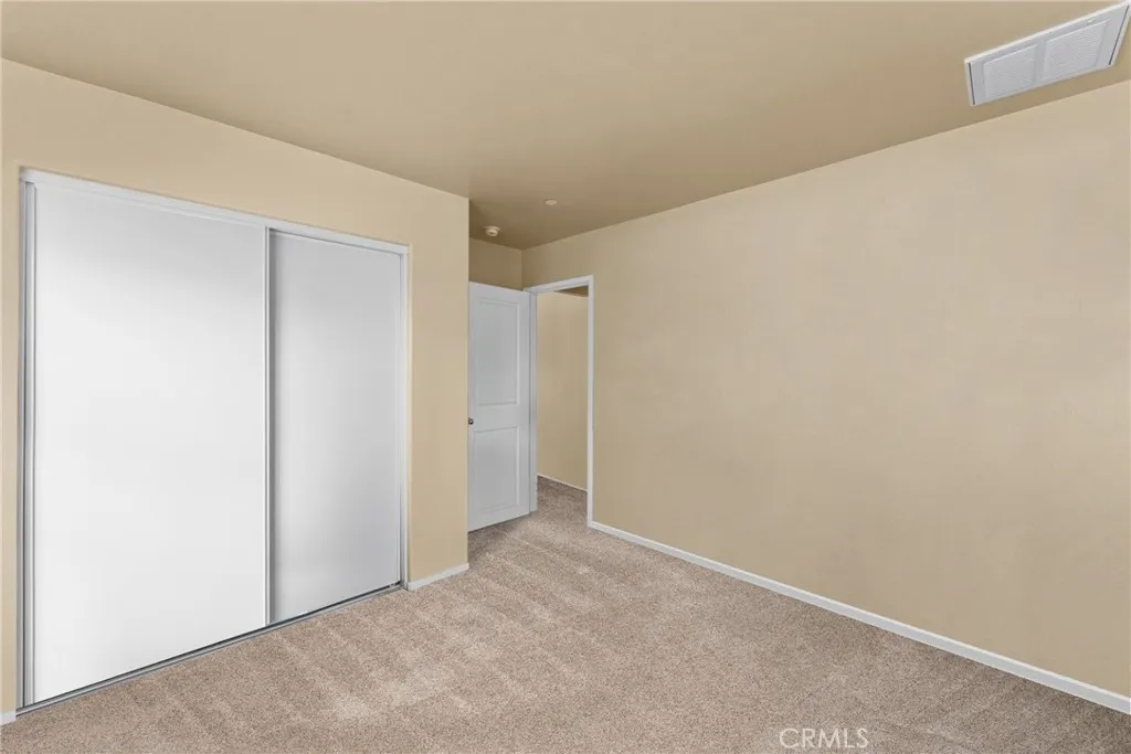 Digitally staged to showcase the full potential and spaciousness of the room.