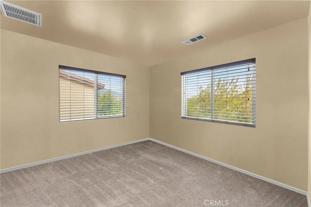 Digitally staged to showcase the full potential and spaciousness of the room.