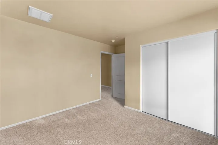 Digitally staged to showcase the full potential and spaciousness of the room.