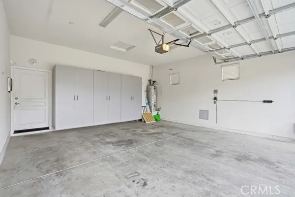 2 car garage with built in cabinets