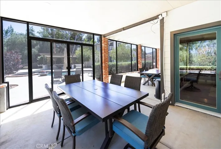 Downstairs wrap around enclosed patio