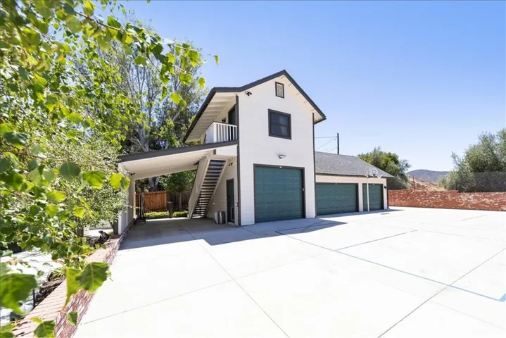 4 car garage with bonus room above