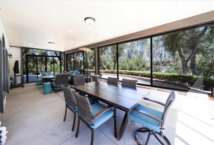 Downstairs wrap around enclosed patio