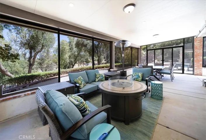Downstairs wrap around enclosed patio