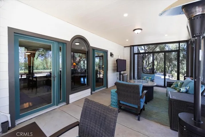 Downstairs wrap around enclosed patio