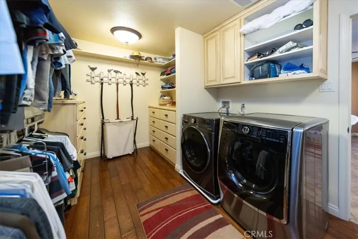 Primary walk-in closet with laundry