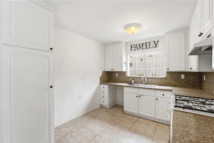 Open kitchen with plenty of cabinets