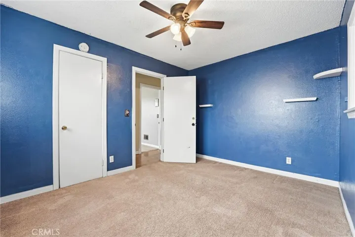 Additional angle of bright bedroom
