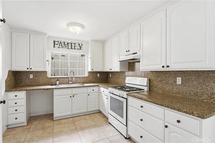 Additional angle of light and bright kitchen