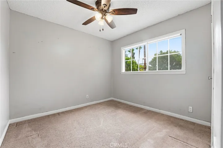 Open bedroom with window for natural lighting