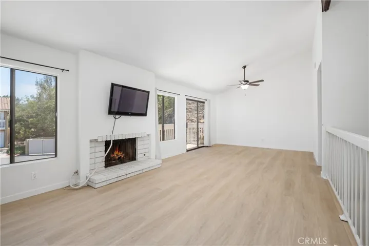 Upstairs Loft w/ fireplace and balcony