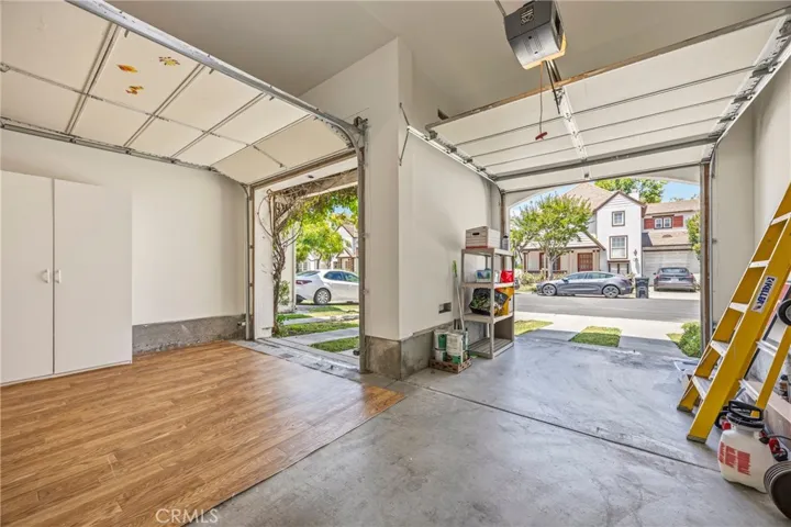 Spacious two-car garage featuring ample built-in storage and versatile space