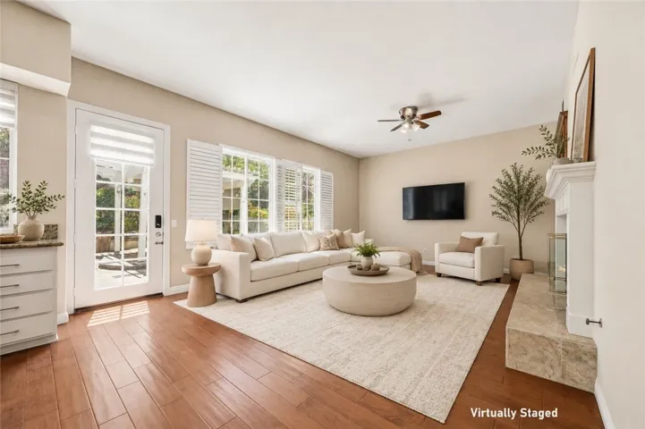 Bright & expansive family room with seamless backyard access. (Virtually Staged)