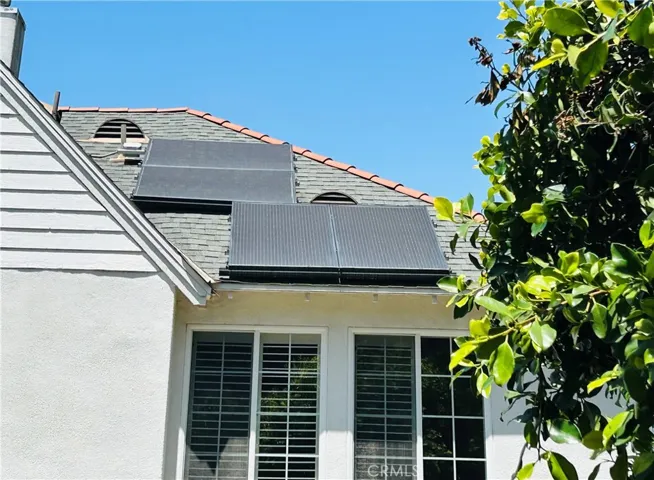 Roof-mounted solar panels designed to reduce electricity costs and save energy