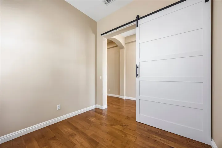Charming office space highlighted by a modern accent barn door