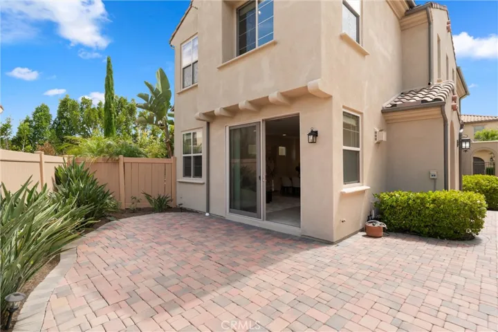 Outdoor patio area with paver hardscape and space for seating, dining, or everyday outdoor enjoyment.