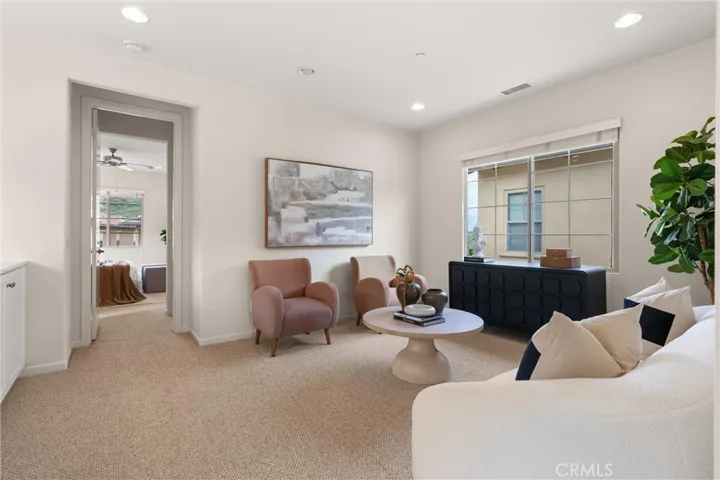 Upper level loft positioned adjacent to the bedroom wing with added space for everyday living or work from home needs.