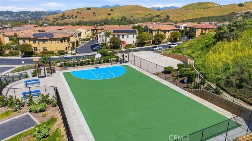 Community recreation area featuring sport courts and outdoor gathering space