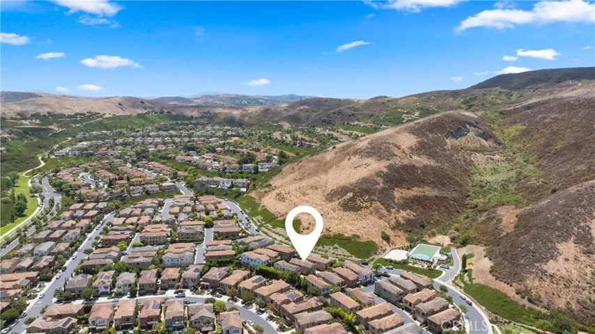 Ideally positioned within the community with a scenic setting adjacent to rolling hills and open space.
