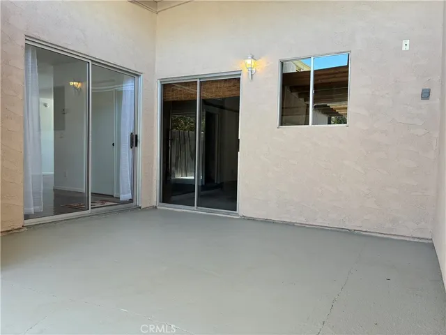 Half of the Large patio area is covered outside the access areas from the dining room and garage. This home has something you don't see in Sierra Bonita too much.... Sliding glass doors to the "garage". Also a window in the garage which let's the light in for the folks who have pets or projects going on in the garage. Could make wonderful office or hobby space!!!