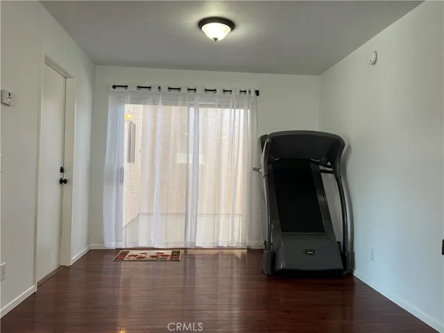 This dining area is just adjacent to the kitchen. It's sliding doors open to the covered patio which is open to the yard and inviting on summer days and protected in winter for folks and pets who enjoy being outdoors.