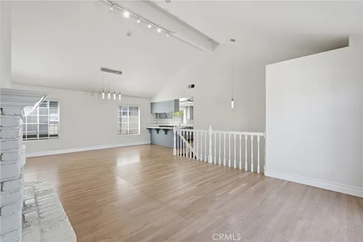 Living room and dining area in background