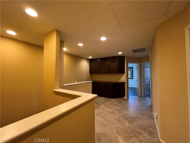 Loft area with cabinet