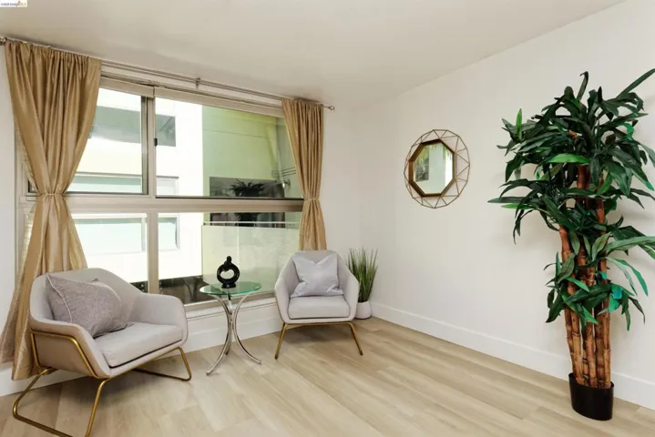 Living area with wood finished floors