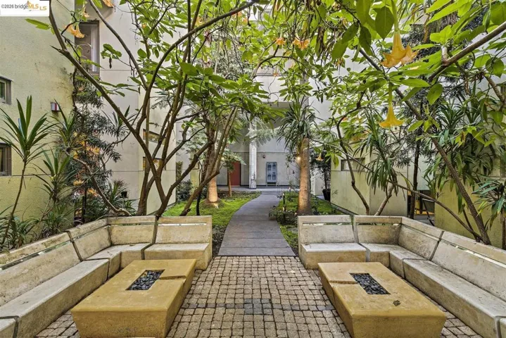 View of home's community featuring a fire pit