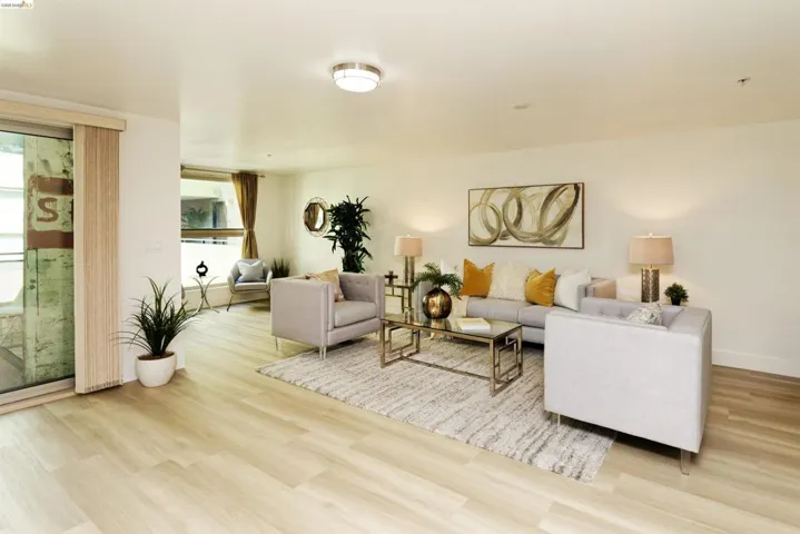 Living area with light wood-style floors
