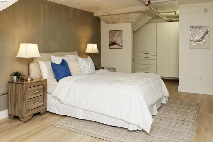 Bedroom with baseboards and light wood-style floors