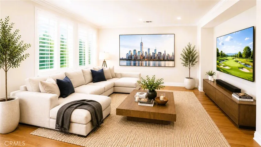 Family room at 89 Winding Way. Look at all that natural light! Photo is virtually staged.
